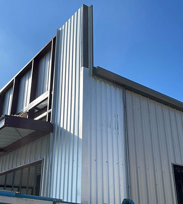 We build large scale metal buildings