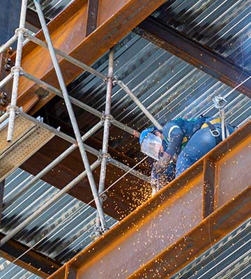 Working Welding on a Metal Building